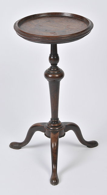 Appraisal: A GEORGE II MAHOGANY KETTLE STAND with circular top on