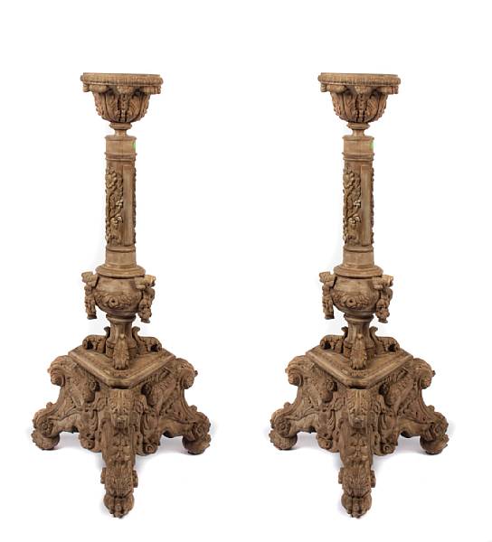 Appraisal: A pair of Italian carved torcheres height ft in diameter