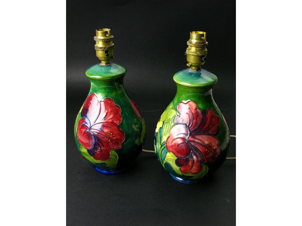 Appraisal: A pair of Moorcroft baluster shaped Table Lamps decorated flowers