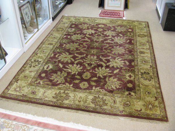 Appraisal: Wool area rug measuring ' wide x ' long with