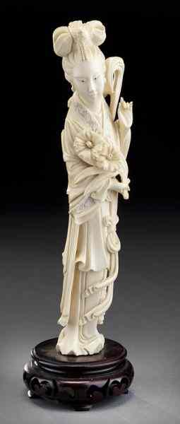 Appraisal: Chinese carved ivory figure depicting a lady International shipping IS