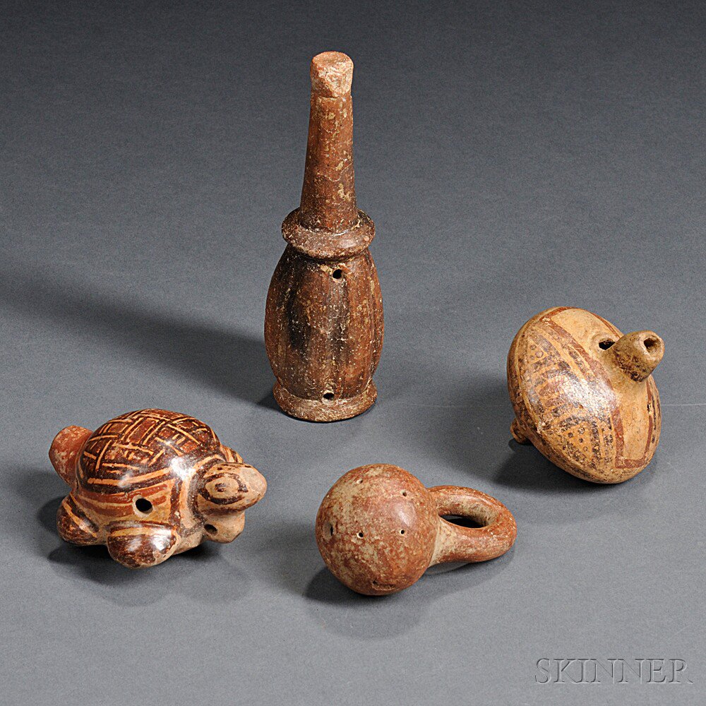 Appraisal: Four Pre-Columbian Pottery Musical Instruments two polychrome ocarinas from Costa