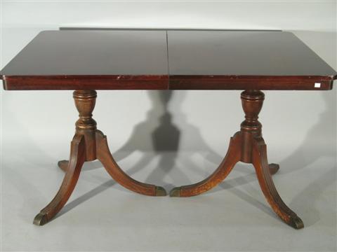 Appraisal: FEDERAL STYLE MAHOGANY PEDESTAL DINING TABLE The rectangular top surrounded