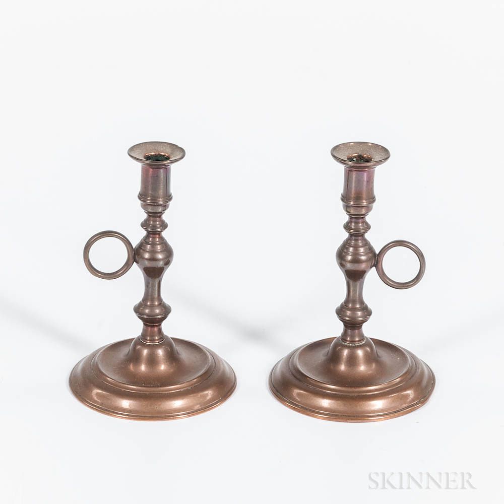 Appraisal: Pair of Bell Metal Tapersticks Pair of Bell Metal Tapersticks