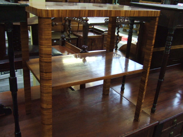 Appraisal: An Art Deco walnut two tier etagere the quarter cut