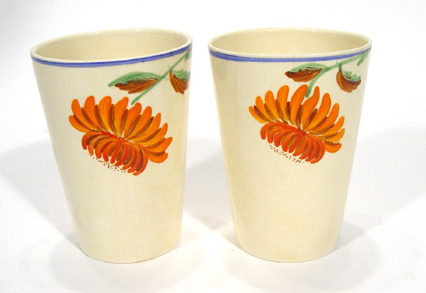 Appraisal: Pair of Clarice Cliff design honeyglaze pottery beakers painted with