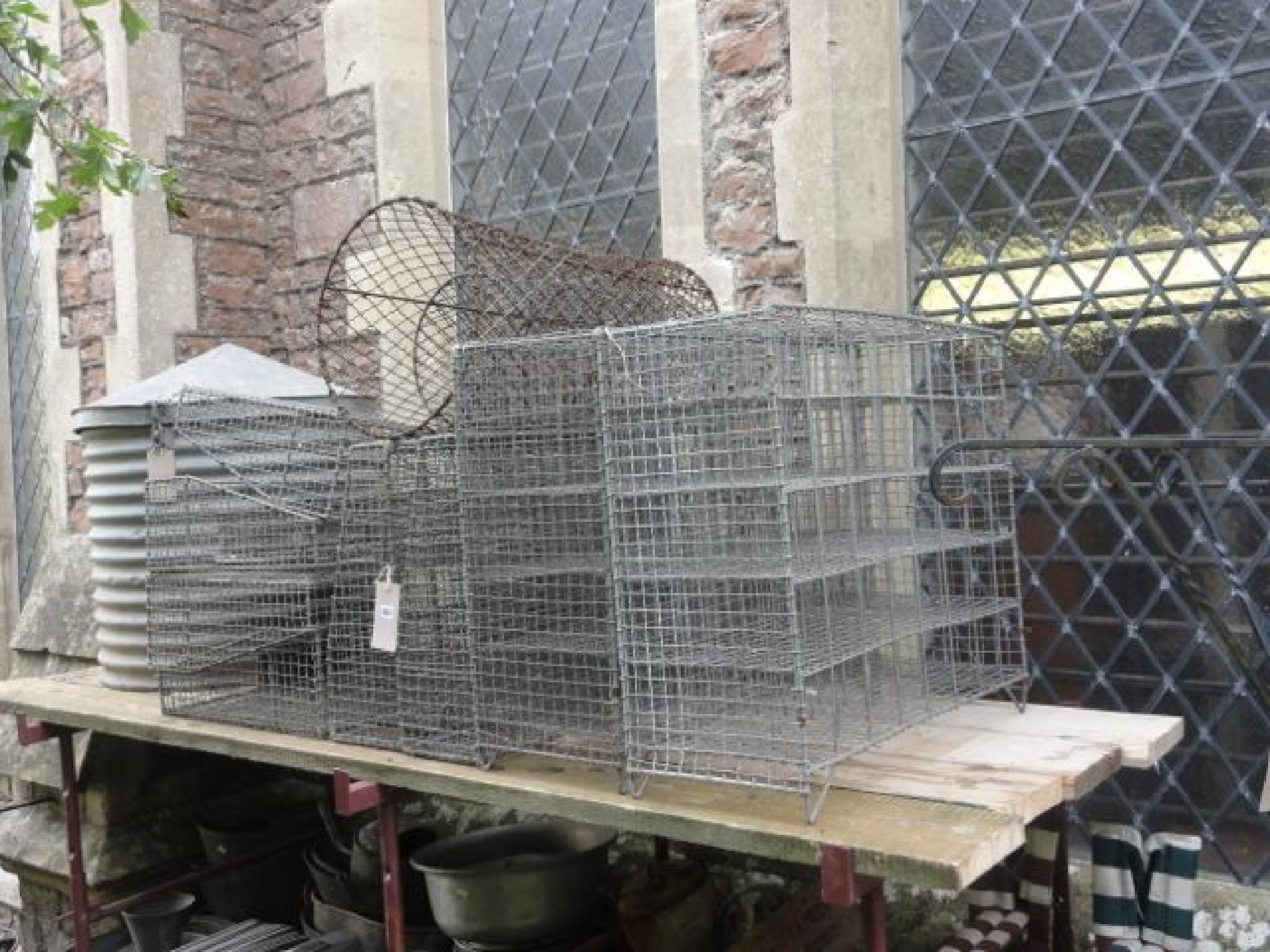 Appraisal: One lot of vintage galvanised wirework wedge shaped rectangular trays