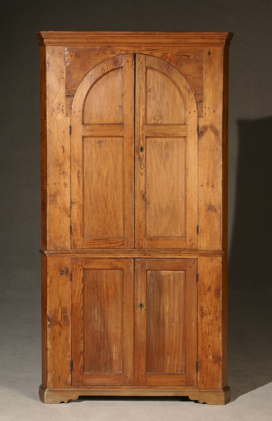 Appraisal: American Waxed Pine Corner Cupboard th Century The one-part cupboard