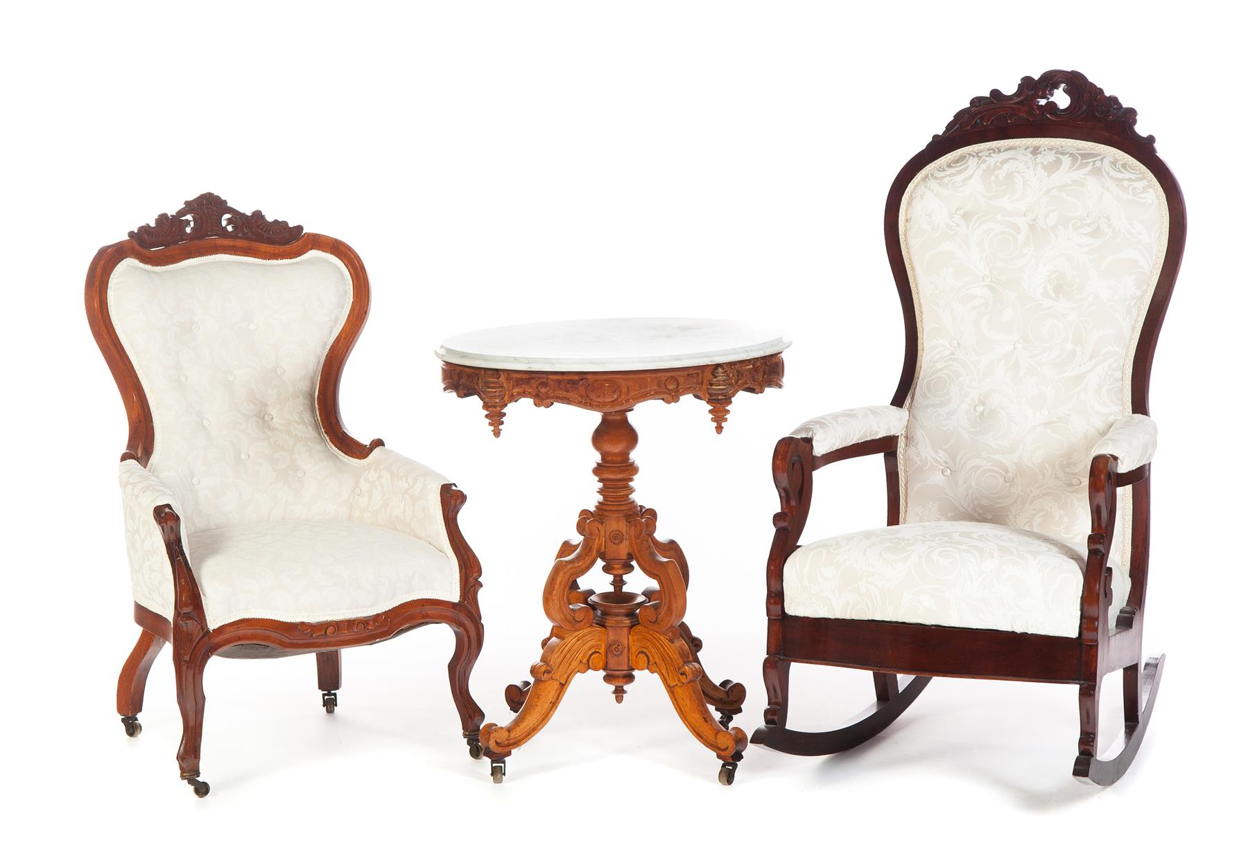 Appraisal: TWO VICTORIAN ARMCHAIRS AND A MARBLE-TOP PARLOR TABLE American late