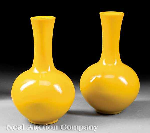 Appraisal: A Pair of Chinese Yellow 'Beijing' Glass Bottle Vases globular