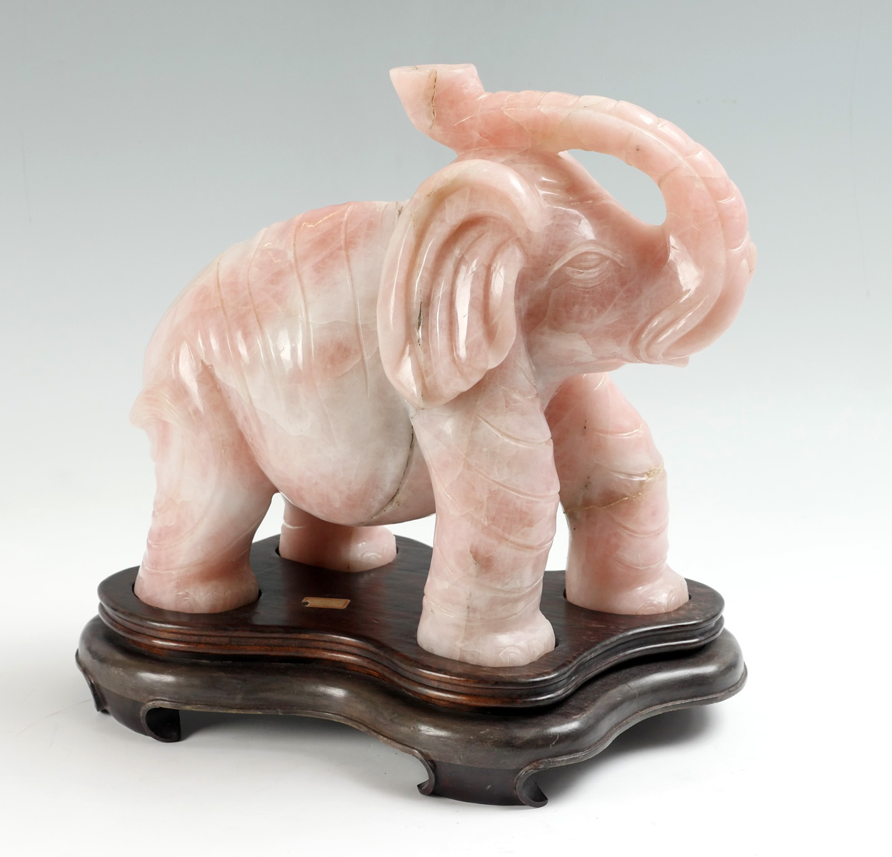 Appraisal: LARGE ROSE QUARTZ CARVED ELEPHANT ON STAND Heavy carved rose