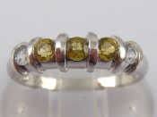 Appraisal: A carat white gold yellow garnet ring size M gms