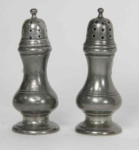 Appraisal: A pair of pewter baluster pepper pots late th Century