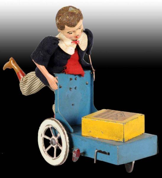 Appraisal: French Martin Tin Wind-Up Boy Porter Toy Description Wind-up Working