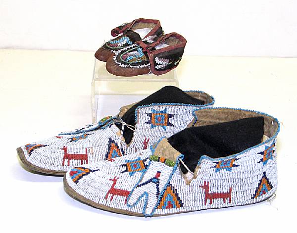 Appraisal: Two pair of beaded moccasins Cheyenne and Iroquois child's examples