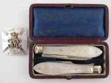 Appraisal: A folding fruit knife and fork hallmarked Sheffield with finely