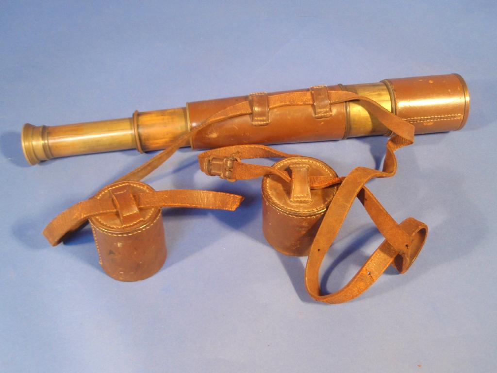 Appraisal: A leather encased brass four pull telescope by Broadhurst Clarkson