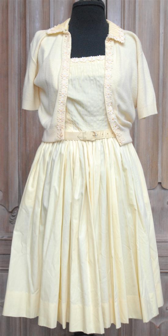 Appraisal: YELLOW COTTON DRESS AND SWEATER Deatils of white shasta daisies