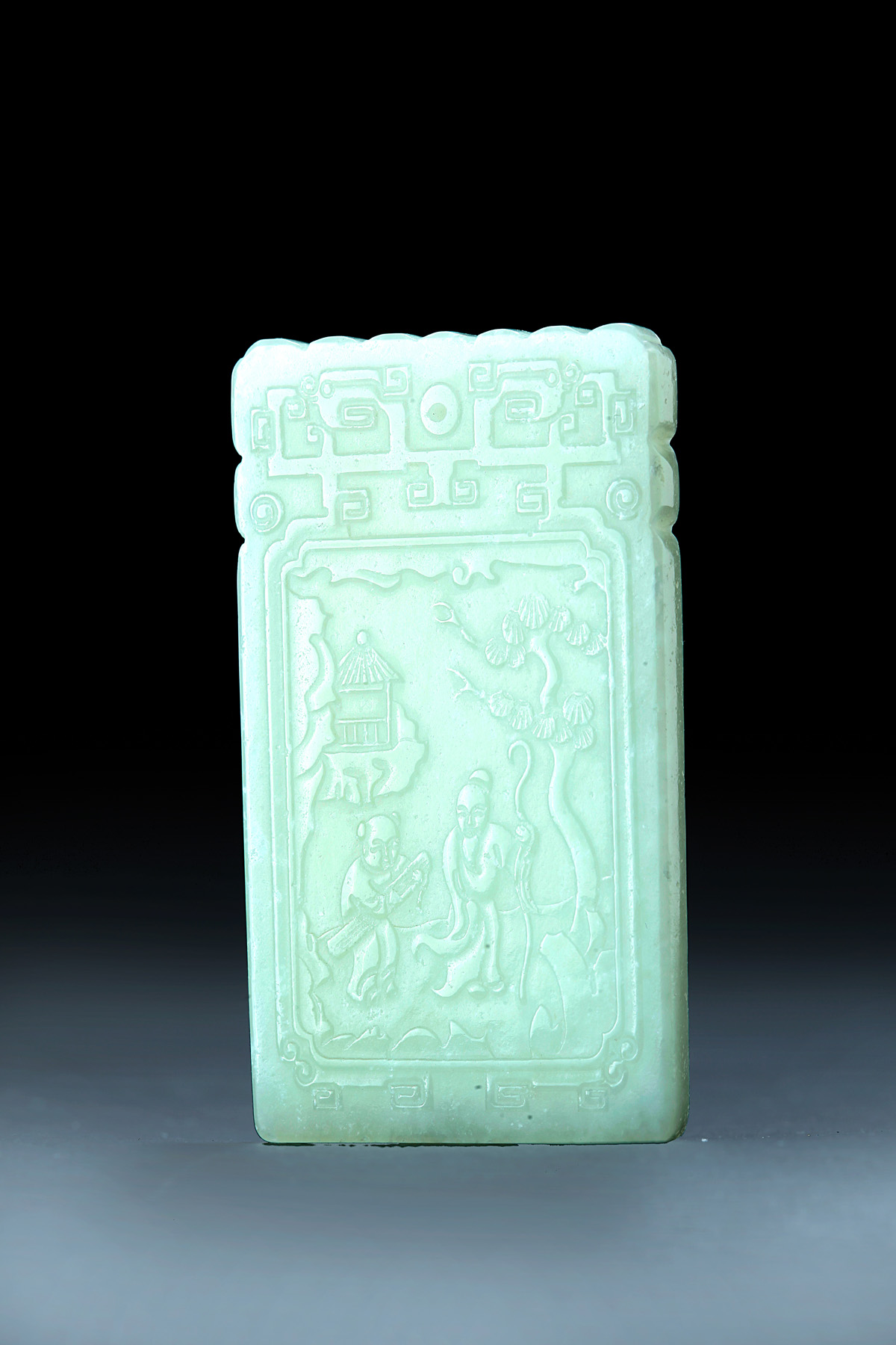 Appraisal: CHINESE JADE CARVED PENDANT Twentieth century Rectangular with low relief