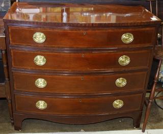 Appraisal: Federal style dresser having a shaped top above the four