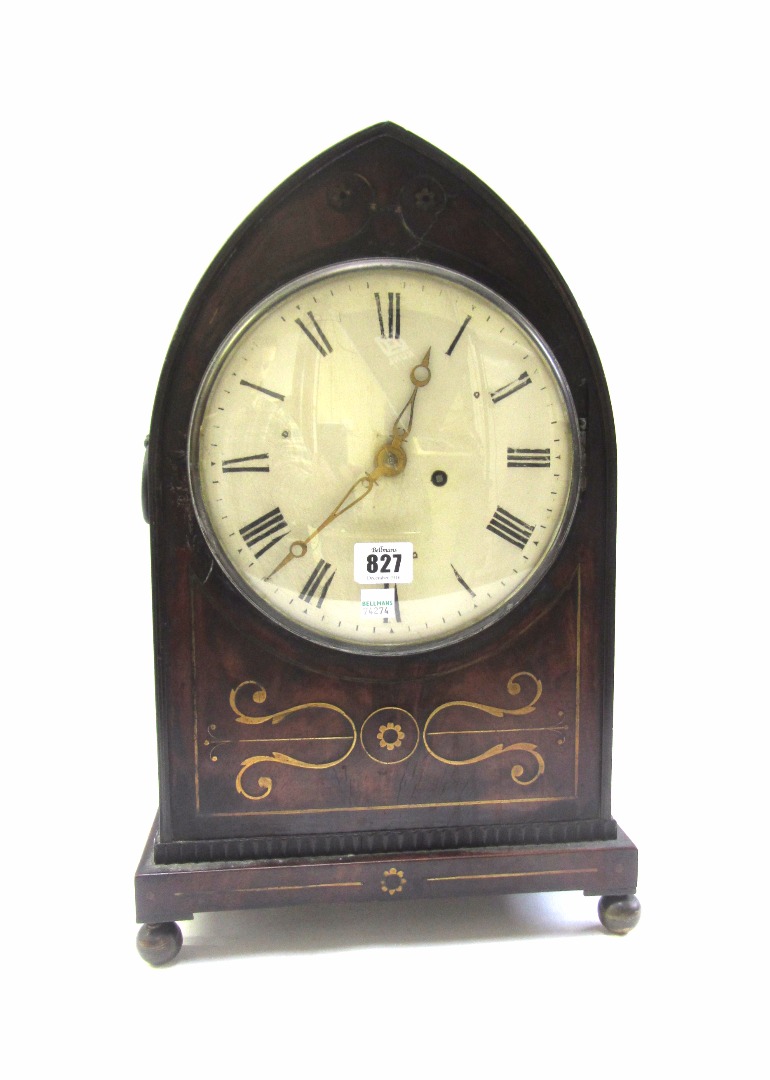 Appraisal: A mahogany and brass inlaid mantel timepiece mid- th century