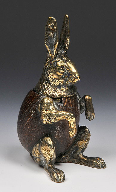 Appraisal: A TH CENTURY INKWELL in the form of a seated