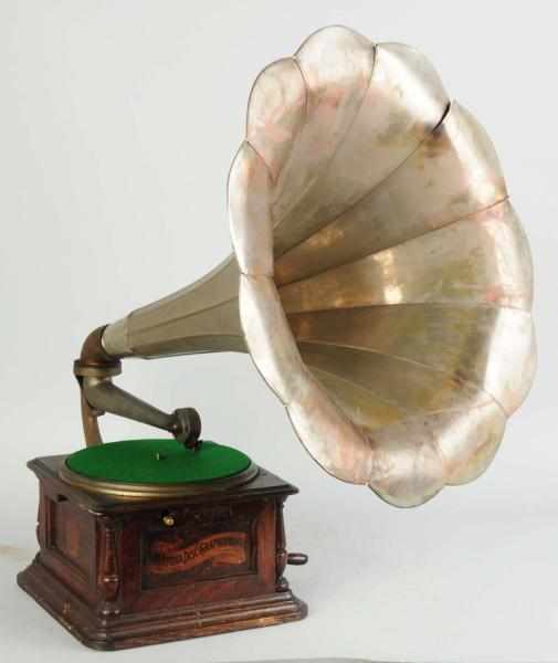 Appraisal: Columbia Disc Phonograph Working Includes silver horn Condition Excellent Size