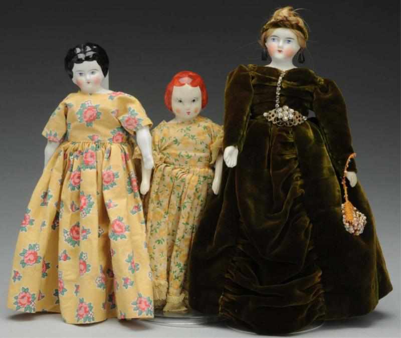 Appraisal: Lot of Dolls Parian shoulder head with painted features pierced