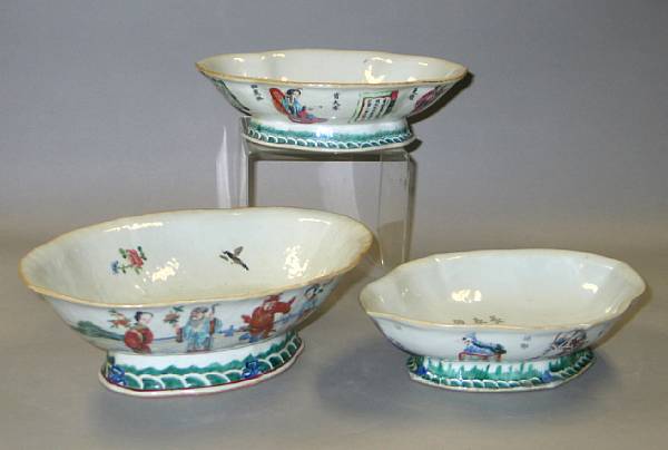 Appraisal: A group of three oval shaped famille rose enameled porcelain