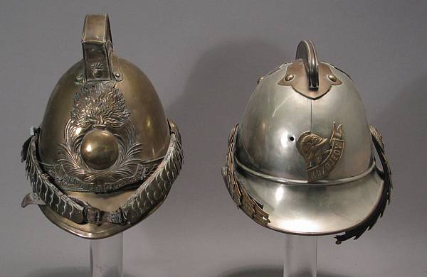 Appraisal: A lot of two continental fireman's helmets Comprising French example