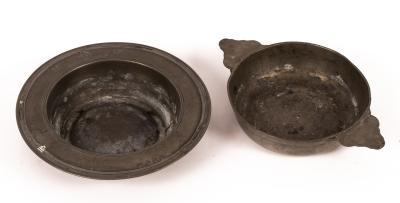 Appraisal: A pewter two-handled dish cm diameter and a bowl with