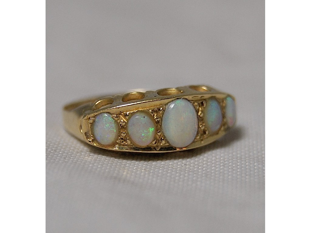 Appraisal: Five stone cabouchon opal ring ct yellow gold set