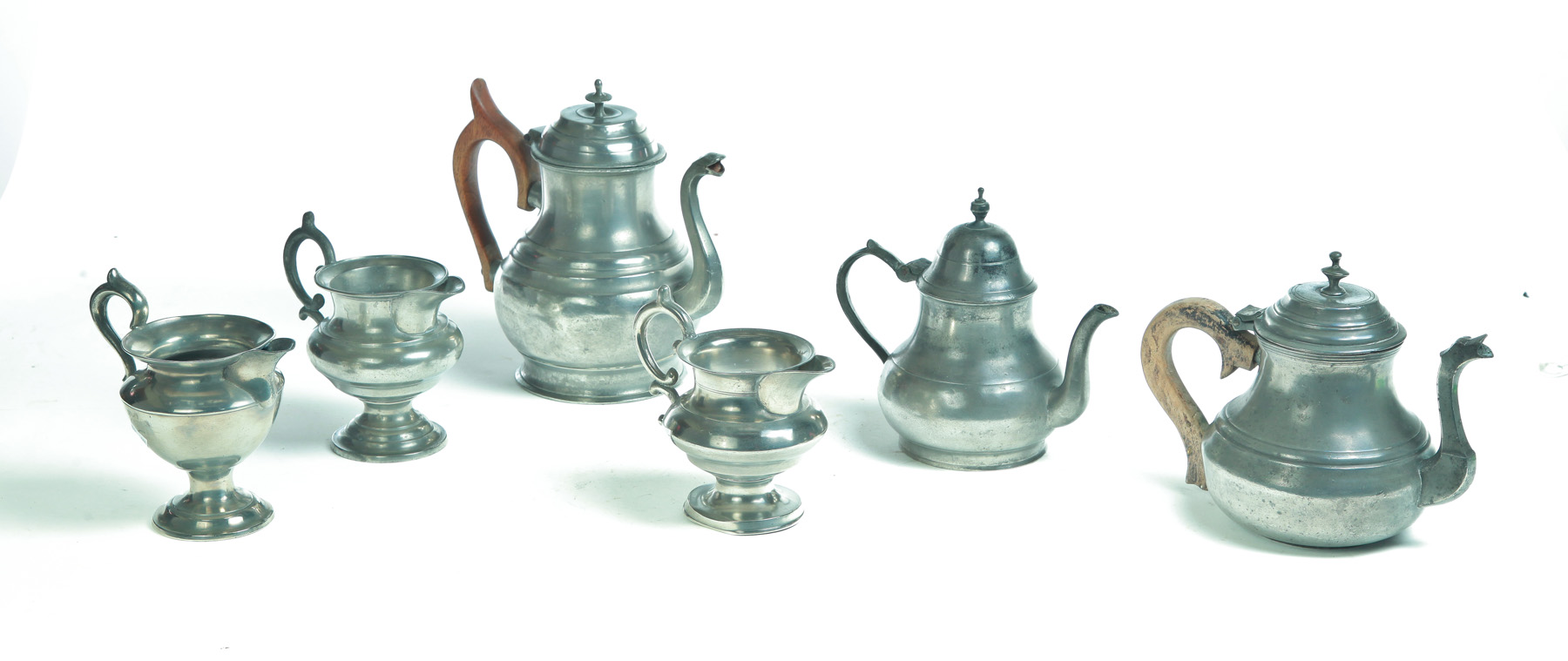 Appraisal: SIX PIECES OF PEWTER Nineteenth century Three American open creamers