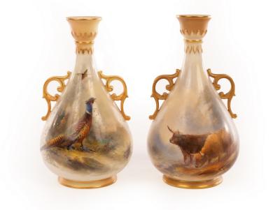 Appraisal: Two Royal Worcester vases each with pierced gilt handles one