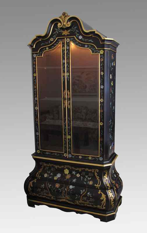 Appraisal: WIDDICOMB BOMBAY SHAPED PAINT DECORATED CABINET Floral motif with gilt