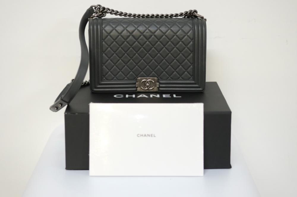 Appraisal: CHANEL GREY NEW IN BOX BOY BAGGrey Chanel jumbo Boy