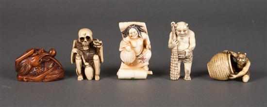 Appraisal: Five Japanese carved ivory and wood demon and dragon netsukes