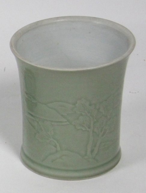 Appraisal: A celadon brush pot of cylindrical form with flanged neck