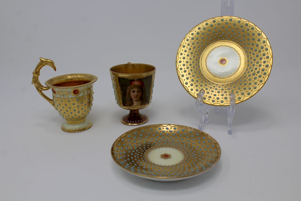 Appraisal: Antique Gilt Porcelain Cups and Saucers Signd Antique Gilt Porcelain