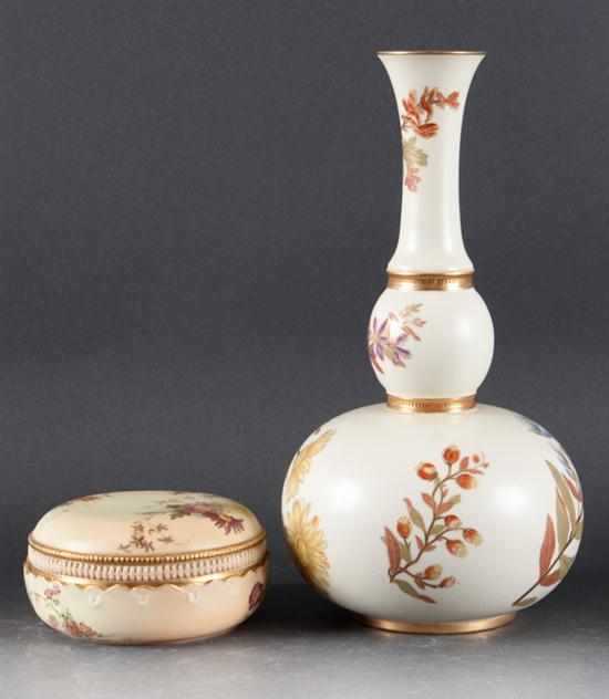 Appraisal: Royal Worcester floral decorated bottle-form vase and similar powder jar