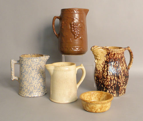 Appraisal: Four earthenware pitchers tallest - h together with a small