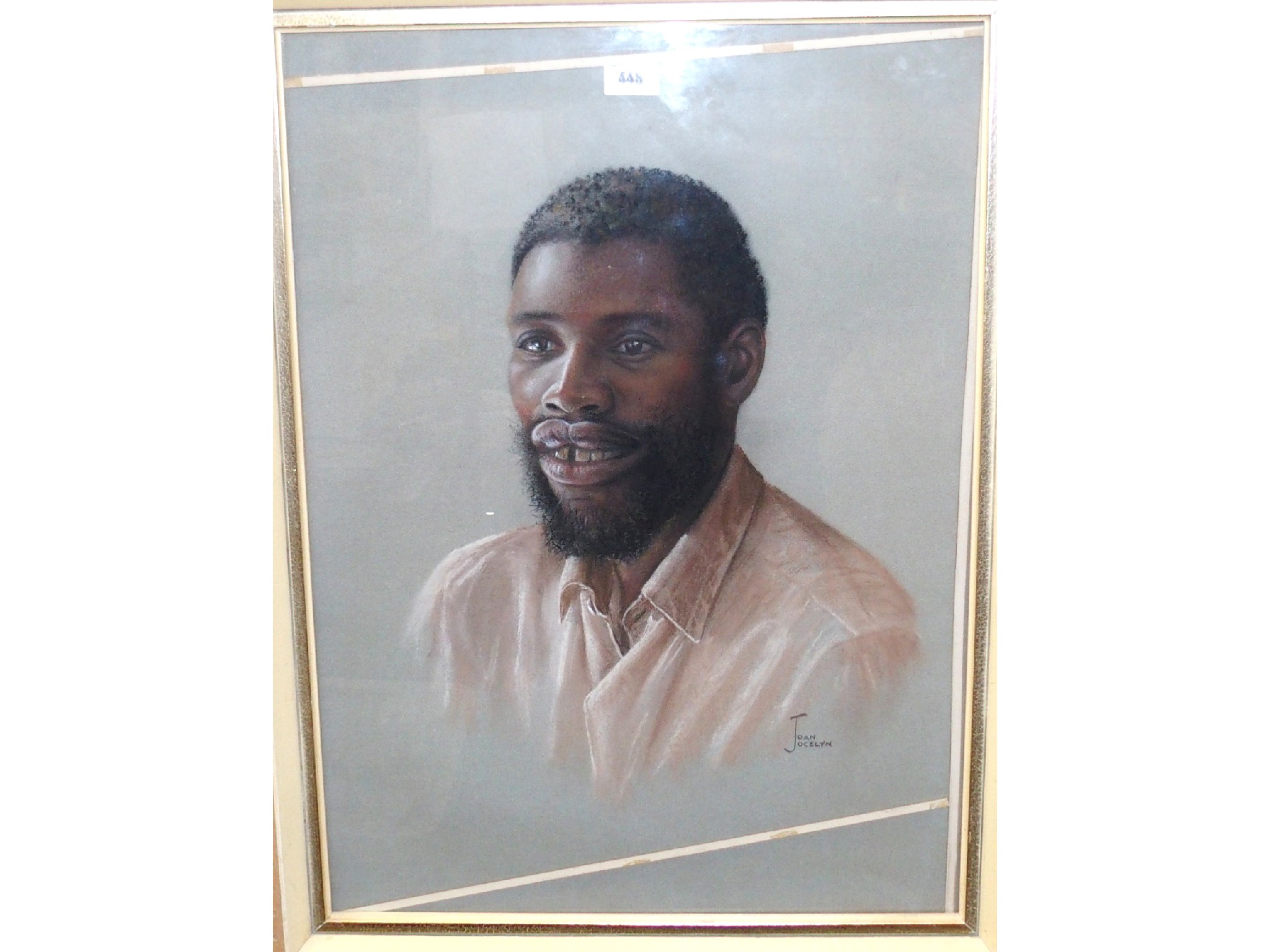 Appraisal: JOAN JOCELYN An African man signed pastel