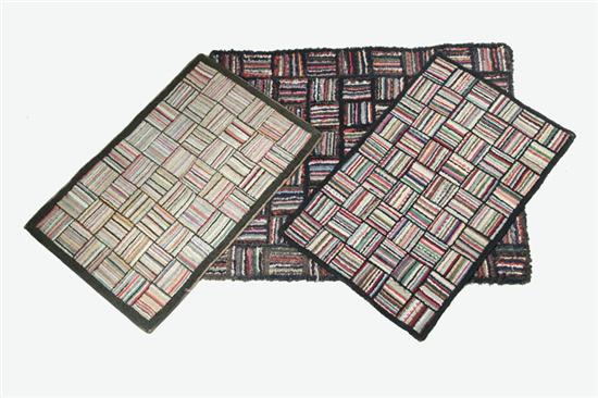 Appraisal: THREE HOOKED RUGS American late th-early th century wools knits