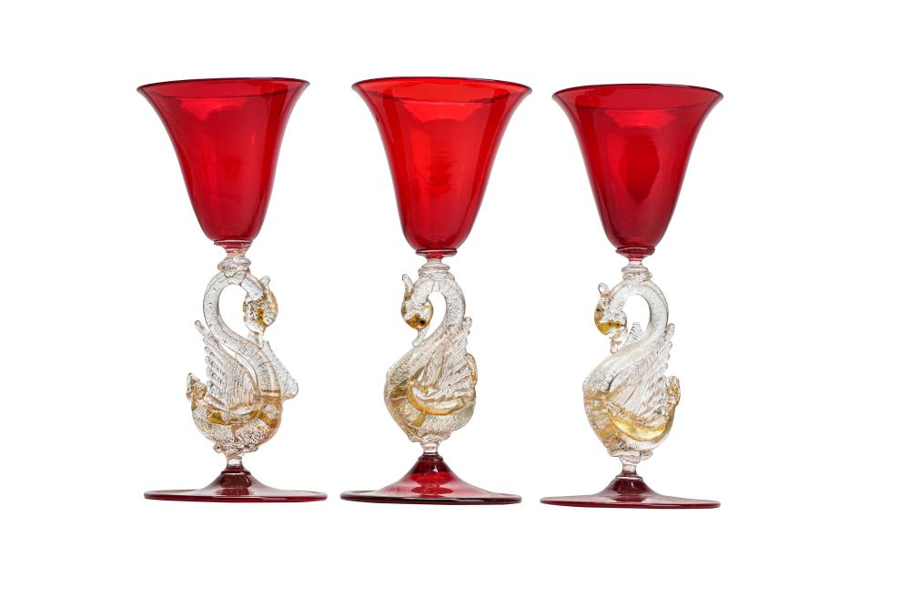 Appraisal: THREE VENETIAN GLASS GOBLETSranging from to inches Condition one repair