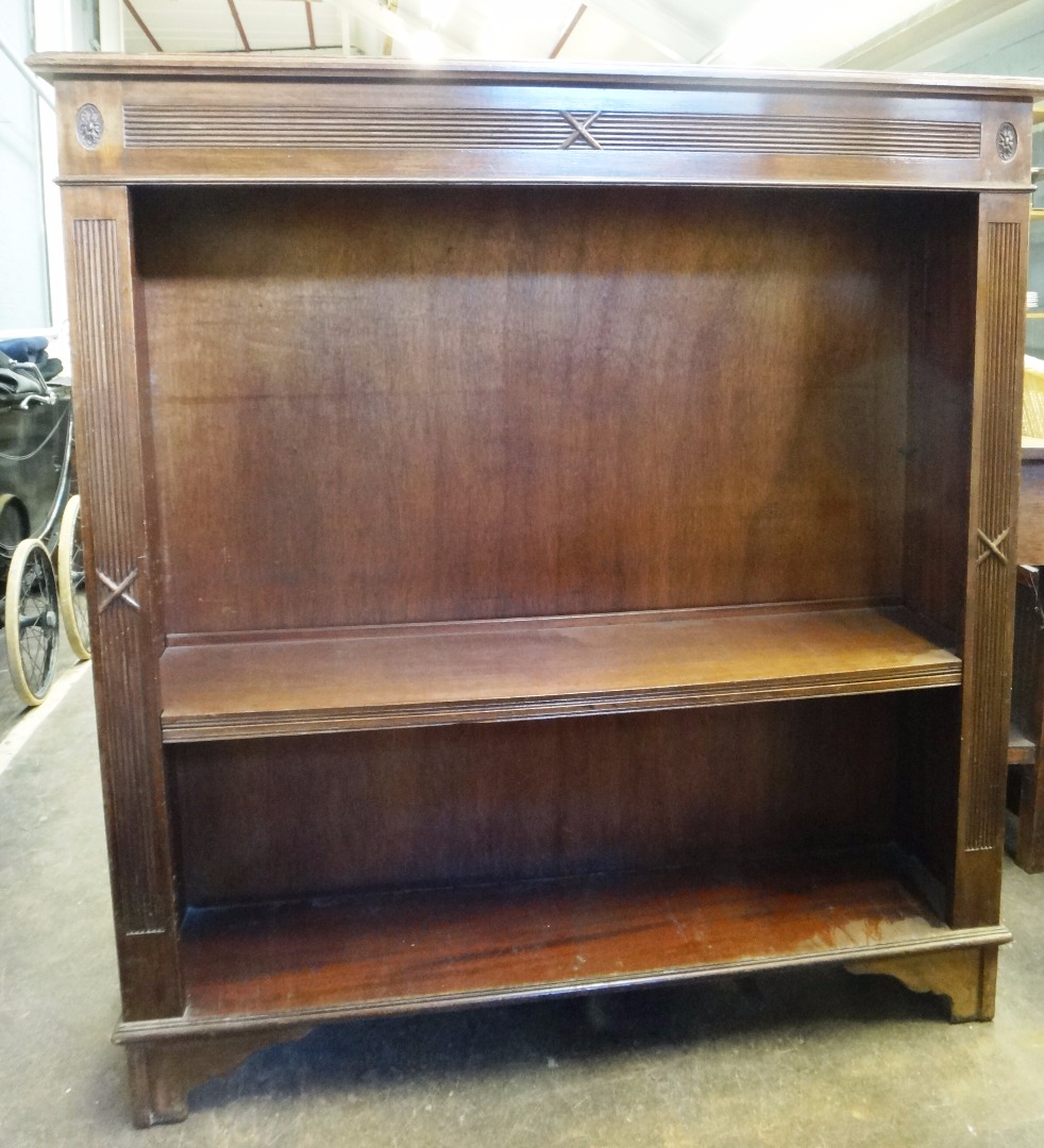 Appraisal: An Edwardian mahogany dwarf open fronted bookcase cm wide and