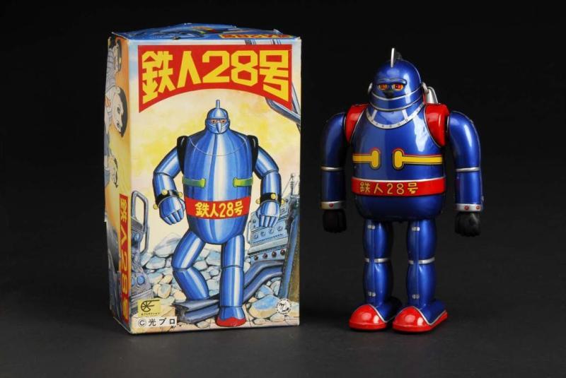 Appraisal: Tin T- Tetsujin Robot Wind-Up Toy Description Japanese Dark blue