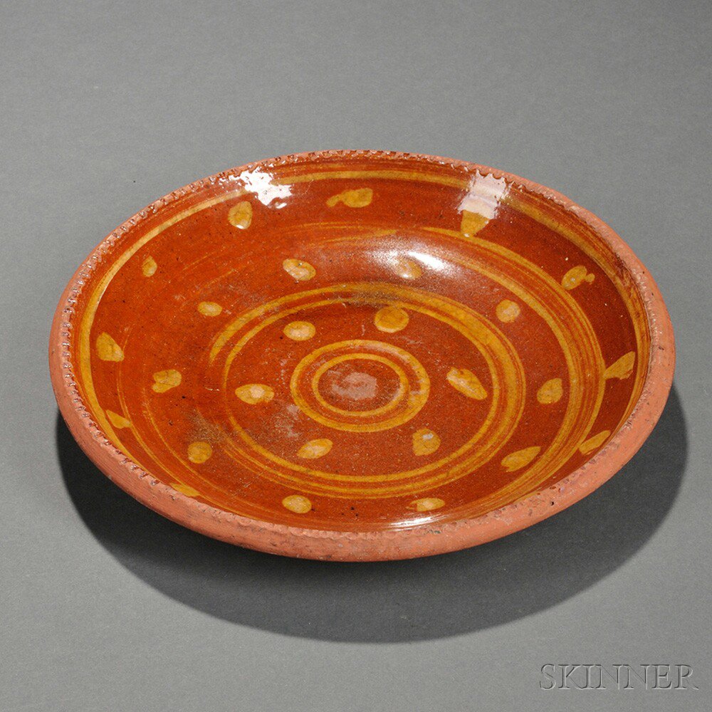 Appraisal: Slip-decorated Redware Pie Plate Chester County Pennsylvania early th century