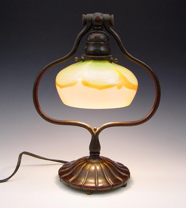 Appraisal: TIFFANY STUDIOS HARP LAMP WITH SIGNED PULLED FEATHER SHADE Bronze