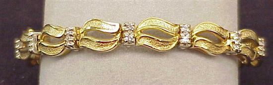 Appraisal: JEWELRY One K yellow gold diamond link bracelet with links