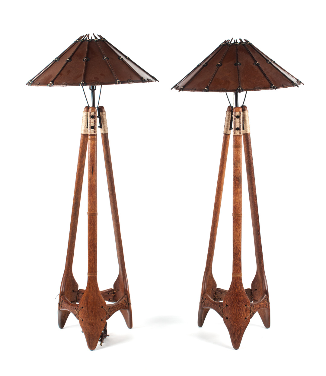 Appraisal: Pair of Pacific Green Navajo palmwood lamps tripod base fastened